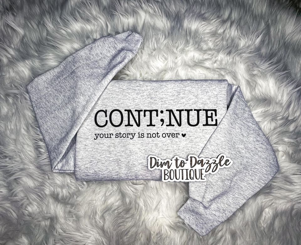 Cont;nue Graphic Crewneck