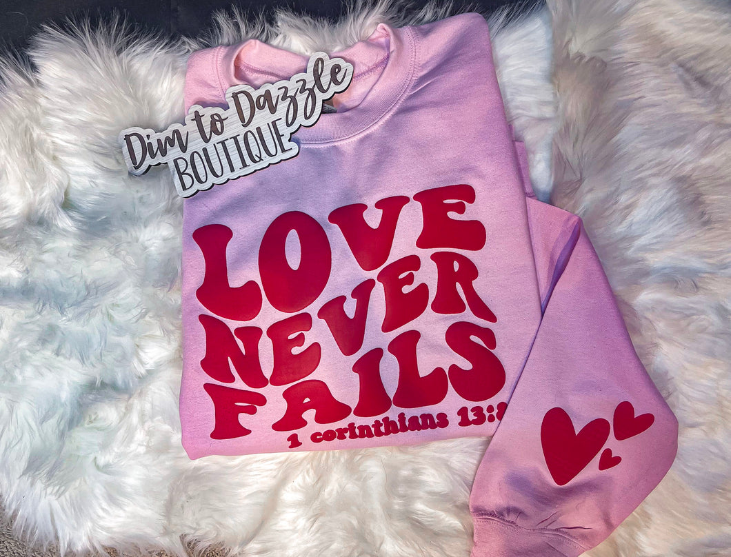 Love Never Fails Graphic Crewneck